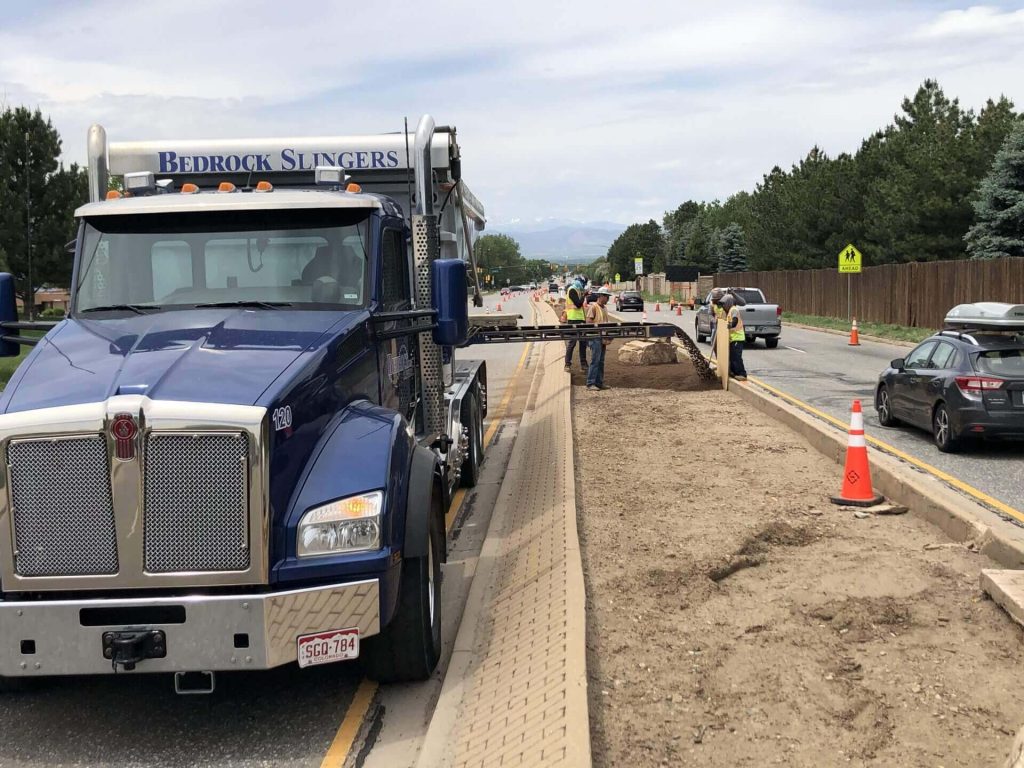 Bedrock Slingers delivered and placed amended soil, improving median landscaping in Colorado